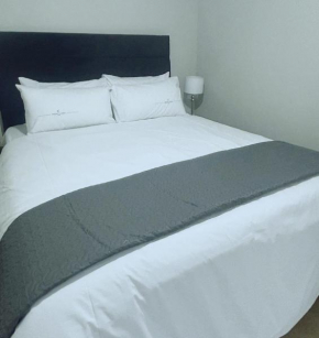 STAY-TIAH Grey Guest Room